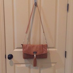 Big  Buddha brown purse with tassel in EUC